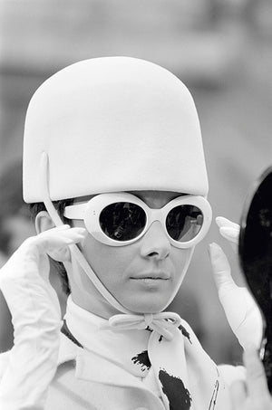 Audrey Hepburn in a white felt helmet and Oliver Goldsmith sunglasses for her role in William Wyler's 1966 comedy caper 