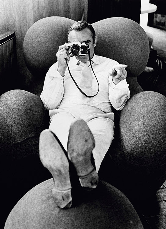 Sean Connery peers through a camera on the set of the James Bond film "Diamonds Are Forever", Las Vegas, 1971 by Terry O'Neill, limited edition photography