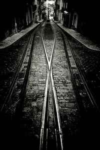 Crossing tram tracks, Lisbon
