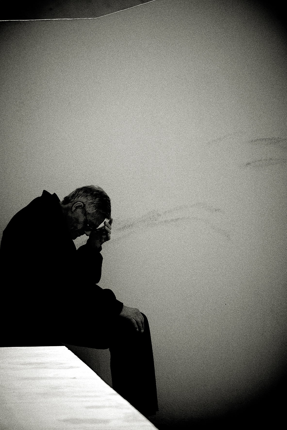 Man Sitting Down, Lisbon by Andreas H. Bitesnich, limited edition photography