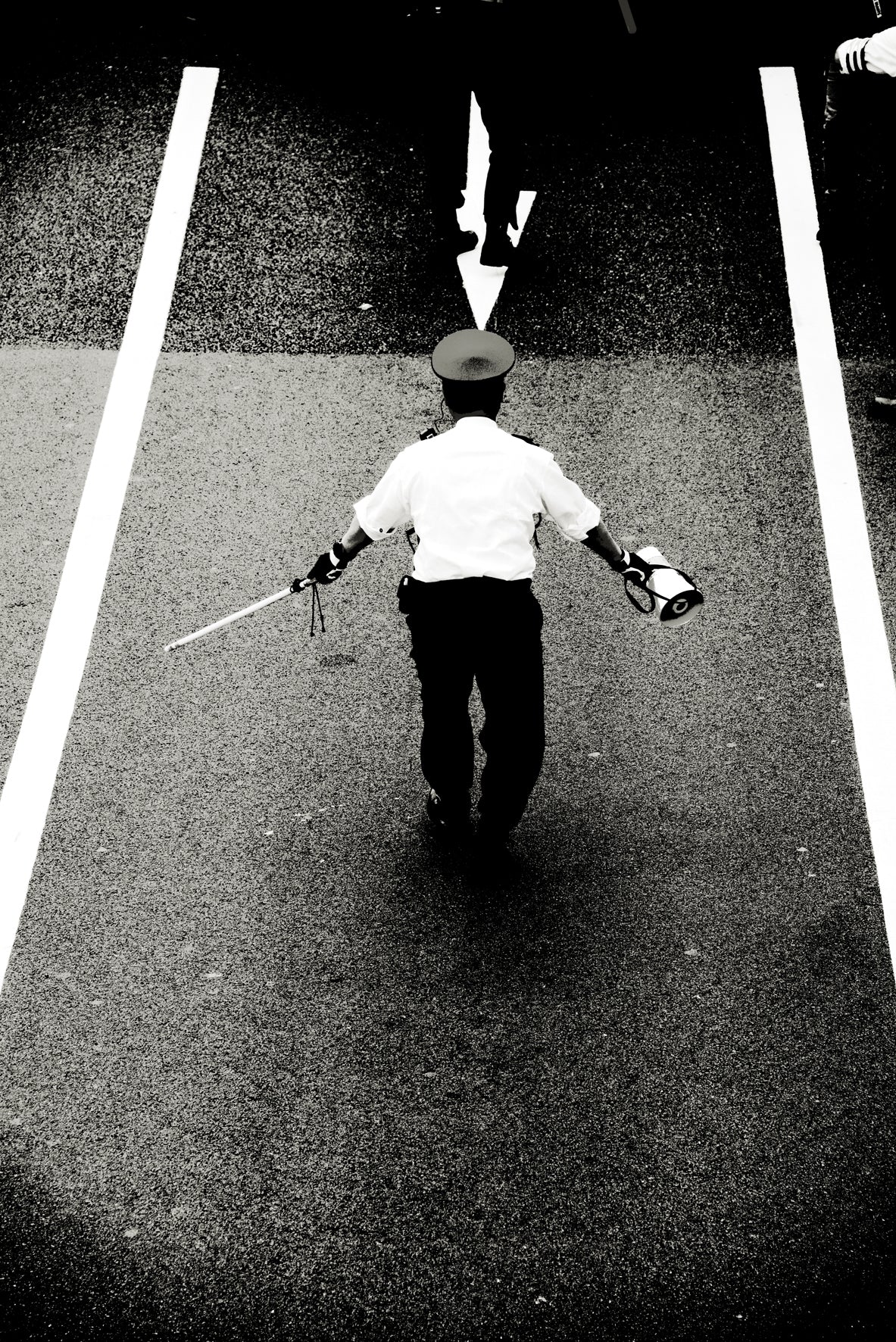 Arrow pointing at man, Tokyo