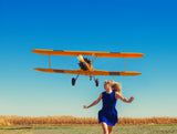 Girl Running from Plane